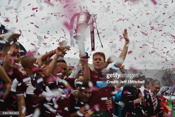 Marius Zaliuskas lifts the William Hill Scottish Cup Final after beating Hibernian in the final at Hampden Park on May 19, 2012 in Glasgow, Scotland.