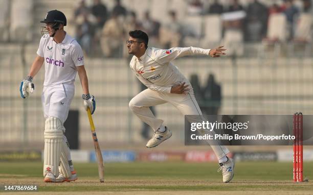 Abrar Ahmed of Pakistan bowls past Harry Brook of England during the first day of the second Test between Pakistan and England at Multan Cricket...