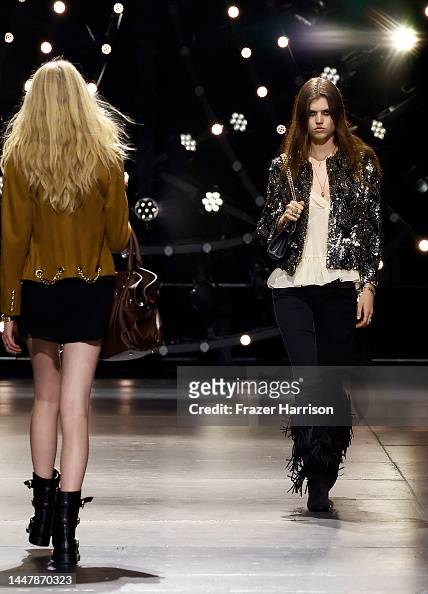 Models walk the runway at Celine at The Wiltern on December 08, 2022 ...