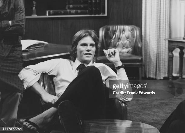 American actor Richard Dean Anderson on the set of soap opera 'General Hospital', wearing a flip-flop after injuring his foot, at Sunset Gower...