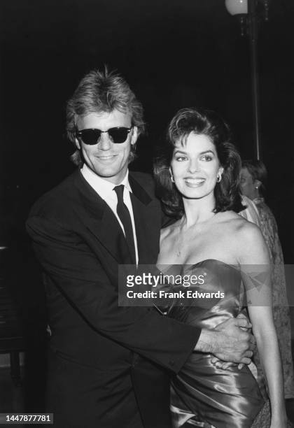 American actor Richard Dean Anderson and American actress Sela Ward attend the Century City premiere of 'Nothing In Common', held at the Plitt...