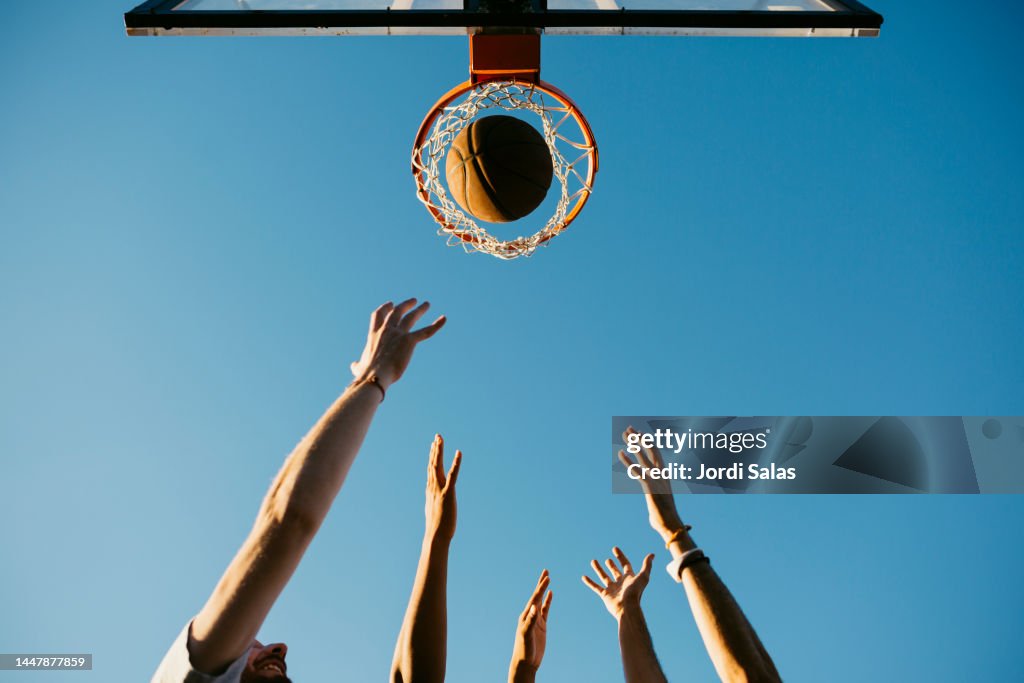 Basketball players playing a match