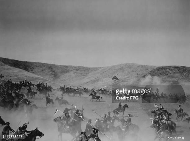 Actors and extras on horseback recreate a battle in the Khyber Pass in a publicity still for 'The Charge of the Light Brigade', filmed in the Sierra...