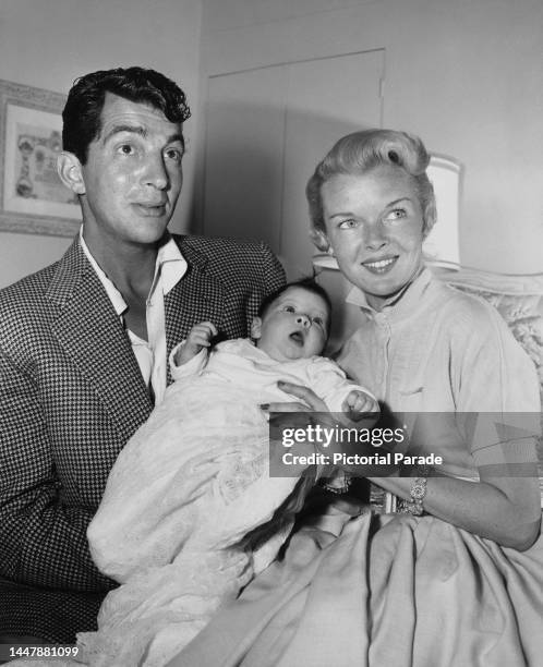 Actor and singer Dean Martin and wife, American beauty queen Jeanne Biegger , with an baby, United States, circa 1953. The couple had three children,...