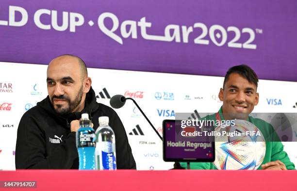 Walid Regragui, Head Coach of Morocco, and Reda Tagnaouti of Morocco speak during the Morocco press conference on match day -1 at main media center...