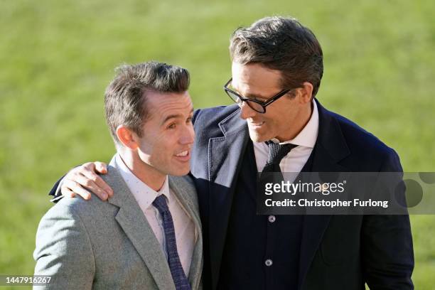 Co-Owners Wrexham AFC Rob McElhenney and Ryan Reynolds talk as they wait for the arrival of King Charles III and Camilla, Queen Consort for their...