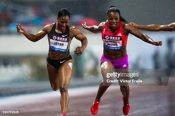Carmelita Jeter of the USA and Veronica Campbell-Brown of Jamaica compete in the Women's 200m during the Samsung Diamond League on May 19, 2012 at...
