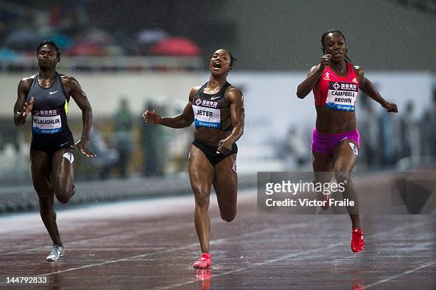Anneisha McLaughlin of Jamaica, Carmelita Jeter of the USA and Veronica Campbell-Brown of Jamaica compete in the Women's 200m during the Samsung...