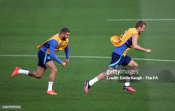 Kyle Walker and Harry Kane of England during a training session at Al Wakrah Stadium on December 09, 2022 in Doha, Qatar.