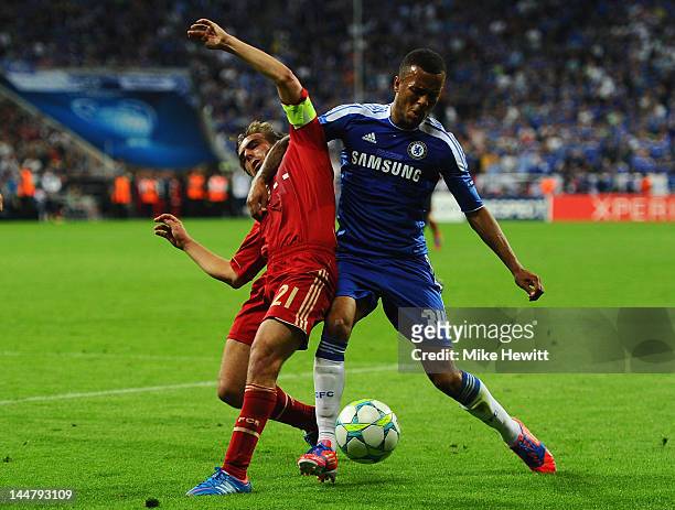 Ryan Bertrand of Chelsea and Philipp Lahm of Bayenr Muenchen fight for the ball during UEFA Champions League Final between FC Bayern Muenchen and...