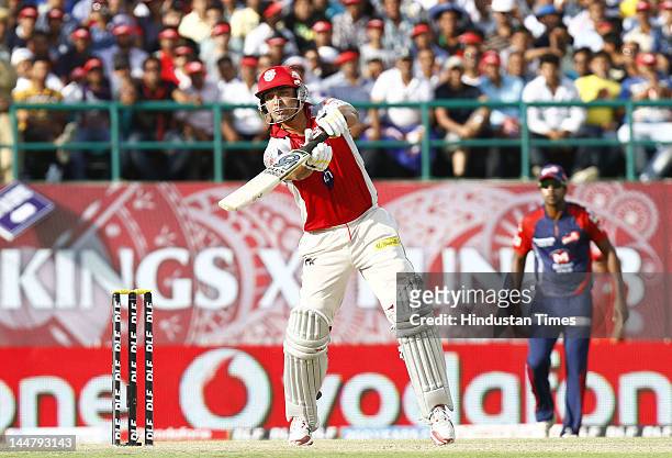 Kings XI Punjab batsman Azhar Mahmood plays a shot during IPL 5 T20 cricket match played between Delhi Daredevils and Kings XI Punjab at HPCA stadium...