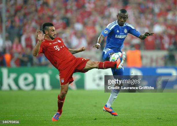 Diego Contento of FC Bayern Muenchen and Salomon Kalou of Chelsea fight for the ball during UEFA Champions League Final between FC Bayern Muenchen...