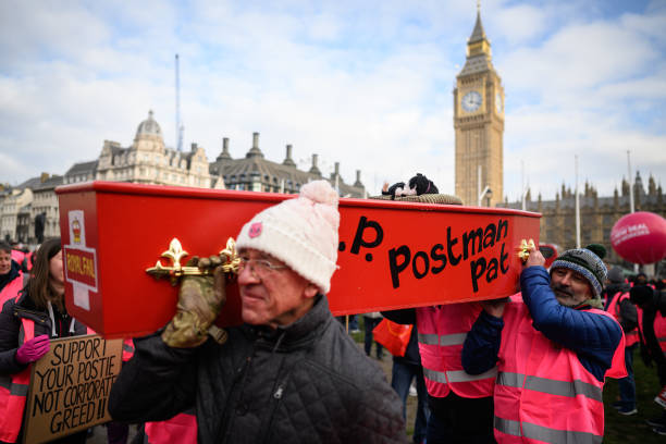 GBR: CWU Striking Postal Workers March To Parliament Square