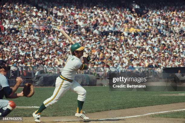American baseball player Dick Green in action during an 1973 World Series match between the Oakland Athletics and the New York Mets, at the...