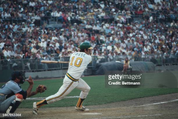 American baseball player Jerry Grote behind American baseball player Ray Fosse during an 1973 World Series match between the Oakland Athletics and...