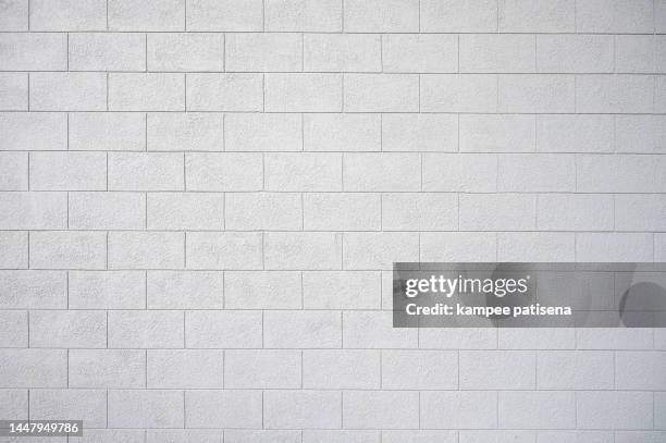 abstract gray wall brick background - bricks fotografías e imágenes de stock