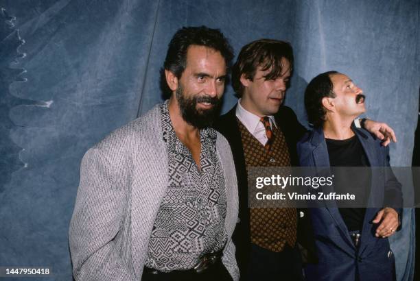 Tommy Chong, an unidentified man and Cheech Marin attend an event, 10th November 1985.