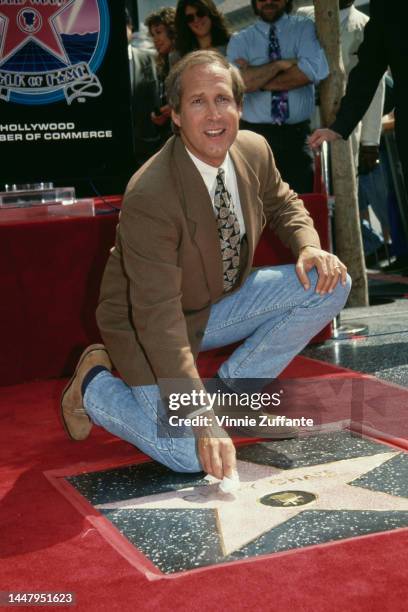 Chevy Chase at the unveiling of his Hollywood Walk of Fame star, California, United States, 23rd September 1993.