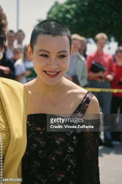Joan Chen attends the 8th Annual IFP/West Independent Spirit Awards at Santa Monica Beach in Santa Monica, California, United States, 27th March 1993.