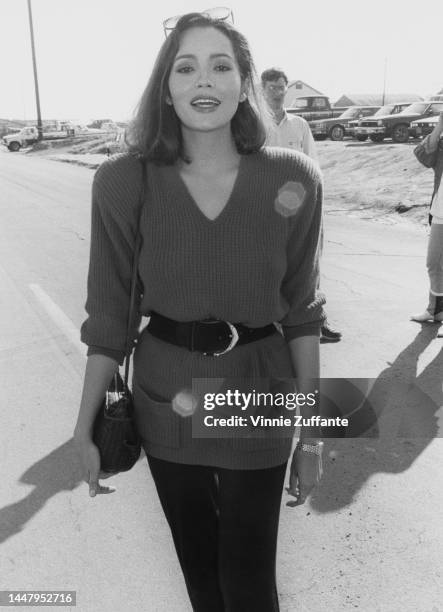 Barbara Carrera during the filming of the fundraising event "Hands Across America", across the United States, 25th May 1986.