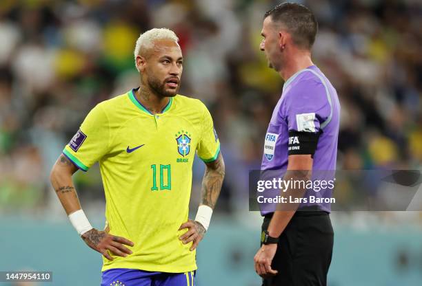 Neymar of Brazil speaks to Referee Michael Oliver during the FIFA World Cup Qatar 2022 quarter final match between Croatia and Brazil at Education...