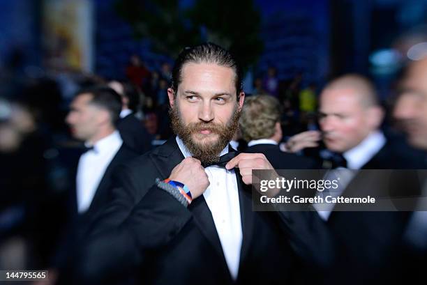 Actor Tom Hardy departs the "Lawless" Premiere during the 65th Annual Cannes Film Festival at Palais des Festivals on May 19, 2012 in Cannes, France.