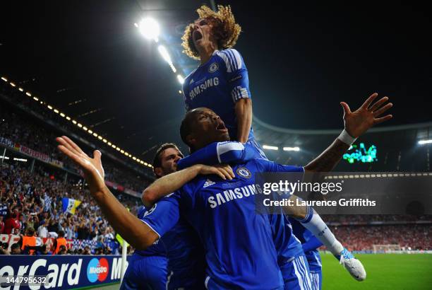 Didier Drogba of Chelsea celebrates with team mates after scoring his team’s first goal during UEFA Champions League Final between FC Bayern Muenchen...