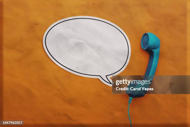 bubble speech and telephone handset - holding speech bubble stock pictures, royalty-free photos & images