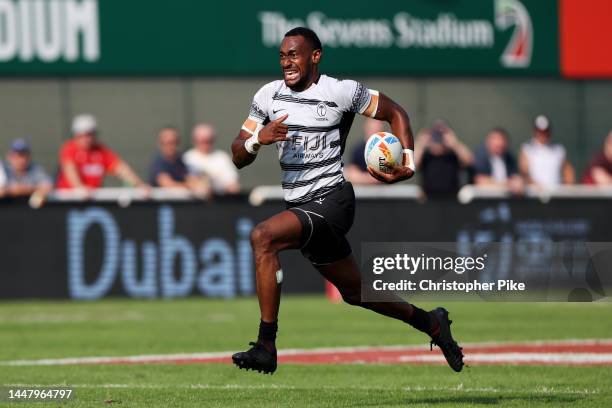 Joseva Talacolo of Fiji runs the ball for a try during the match between Fiji and New Zealand on day one of the HSBC World Rugby Sevens Series -...