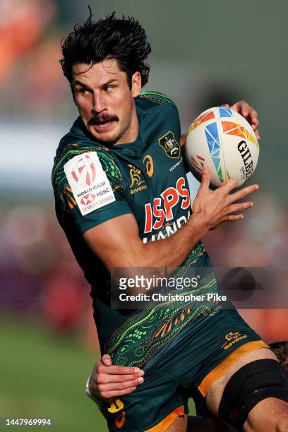 Henry Paterson of Australia runs the ball during the match between Great Britain and Australia on day one of the HSBC World Rugby Sevens Series -...