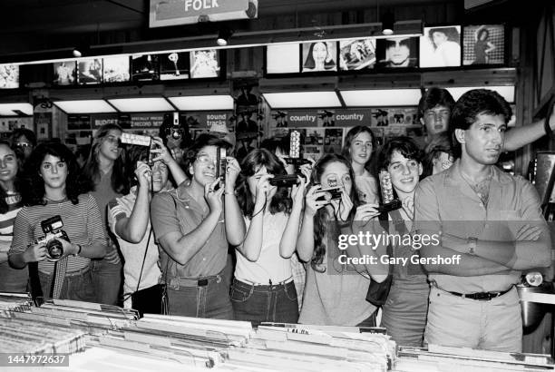 View of Rick Springfield fans as they attend an album signing at J&R Music store, New York, New York, June 18, 1981. At the time, the Pop musician...