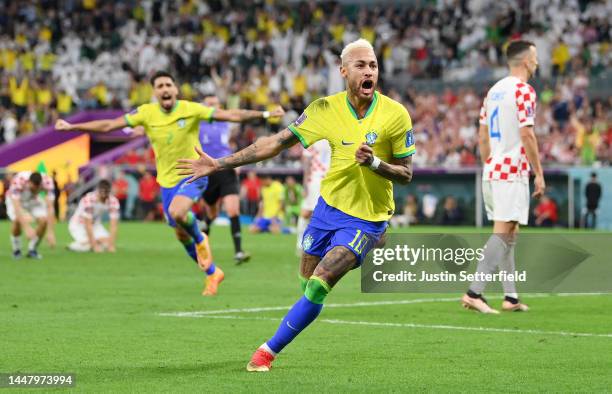 Neymar of Brazil celebrates after scoring the team's first goal during the FIFA World Cup Qatar 2022 quarter final match between Croatia and Brazil...