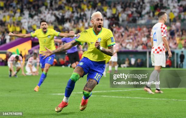 Neymar of Brazil celebrates after scoring the team's first goal during the FIFA World Cup Qatar 2022 quarter final match between Croatia and Brazil...