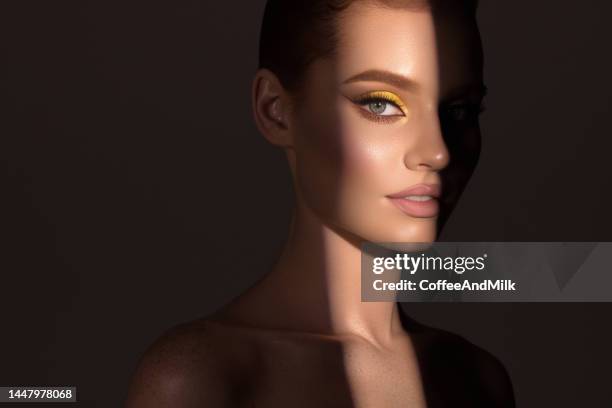 beautiful woman with bright make-up - beautiful woman and eyeshadow stock pictures, royalty-free photos & images