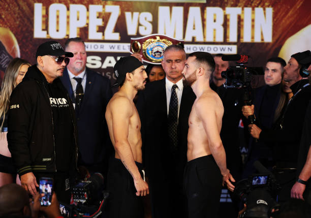 Teofimo Lopez and Sandor Martin face off at the weigh in for their junior welterweight in the Hulu Theatre at Madison Square Garden on December 09,...