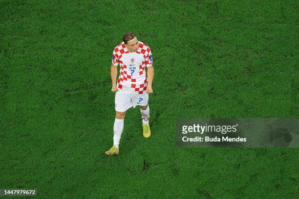Lovro Majer of Croatia celebrates scoring the team's second penalty in the penalty shoot out during the FIFA World Cup Qatar 2022 quarter final match...
