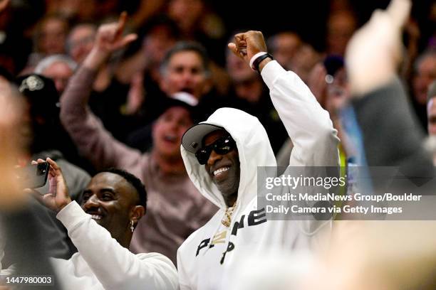 Colorado Buffaloes' head football coach Deion Sanders cheers on the basketball team at the game against the Colorado State Rams in Boulder on...