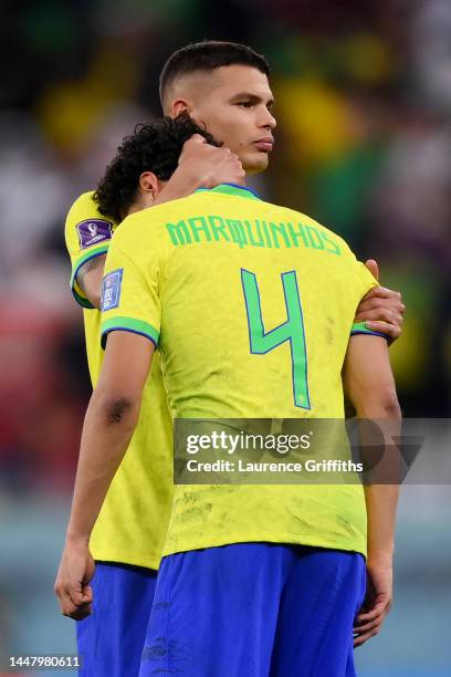 Marquinhos reacts with Thiago Silva of Brazil after missing the deciding penalty in the penalty shoot out during the FIFA World Cup Qatar 2022...