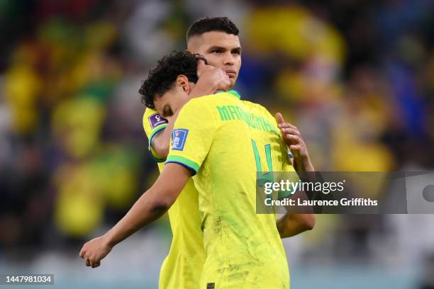 Marquinhos reacts with Thiago Silva of Brazil after missing the deciding penalty in the penalty shoot out during the FIFA World Cup Qatar 2022...