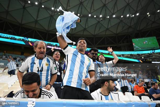 Argentina fan celebrate after Brazil's elimination through the penalty shootout of Croatia and Brazil prior to the FIFA World Cup Qatar 2022 quarter...