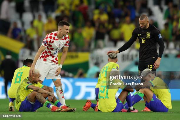 Ivan Perisic of Croatia embraces Neymar of Brazil after the penalty shoot out during the FIFA World Cup Qatar 2022 quarter final match between...