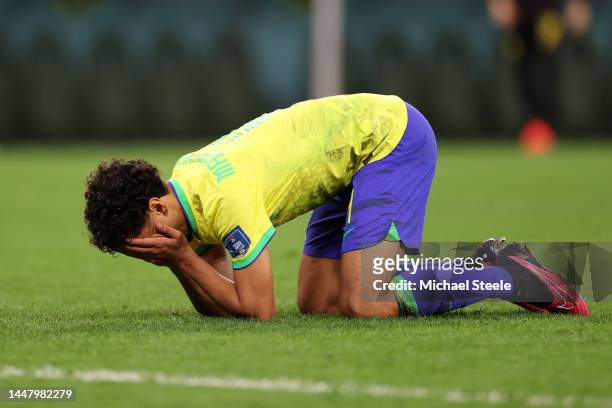 Marquinhos of Brazil reacts after missing the deciding penalty in the penalty shoot out during the FIFA World Cup Qatar 2022 quarter final match...