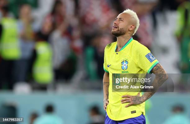 Neymar of Brazil looks dejected after their sides' elimination from the tournament after a penalty shoot out loss during the FIFA World Cup Qatar...