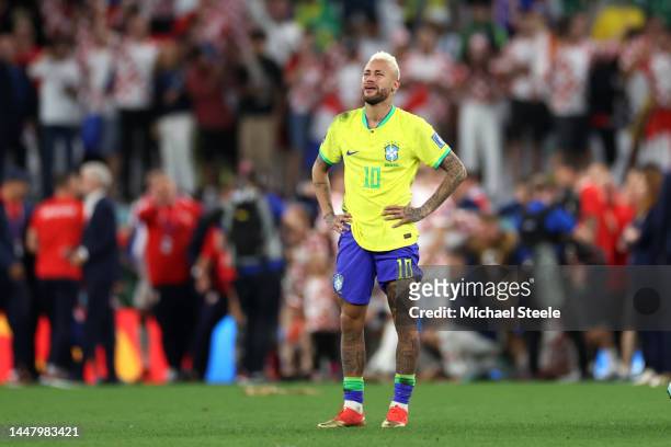 Neymar of Brazil looks dejected after their sides' elimination from the tournament after a penalty shoot out loss during the FIFA World Cup Qatar...
