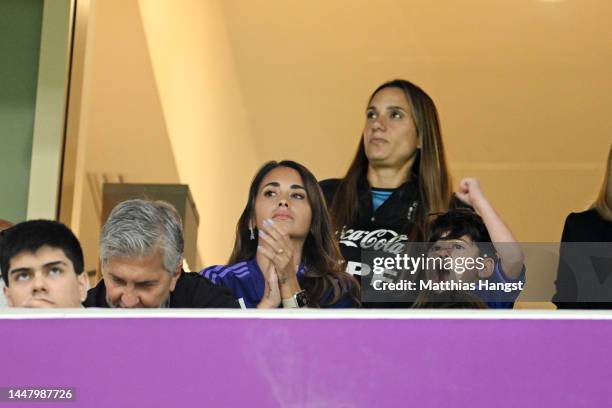 Antonela Roccuzzo, Lionel Messi of Argentina's wife, and Mateo Messi Roccuzzo, Son of Lionel Messi, look on from a hospitality box prior to kick off...