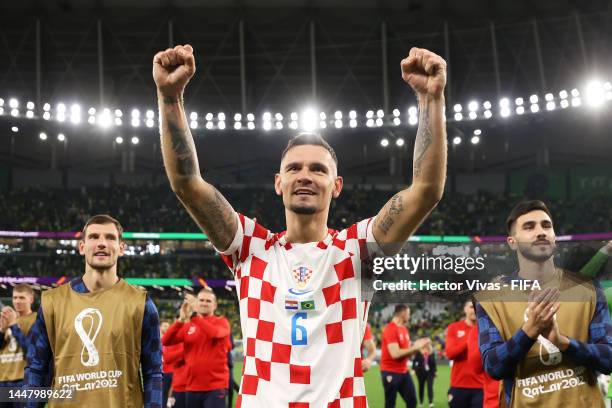 Dejan Lovren of Croatia celebrates after the team's victory in the penalty shoot out during the FIFA World Cup Qatar 2022 quarter final match between...