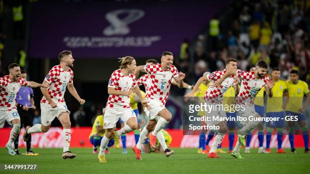 Bruno Petkovic, Lovro Majer, Dejan Lovren, Ante Budimir and Josko Gvardiol of Croatia celebrating victory after the FIFA World Cup Qatar 2022 quarter...