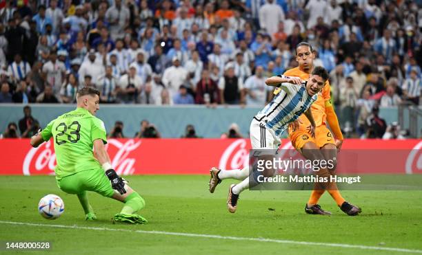 Nahuel Molina of Argentina scores the team's first goal during the FIFA World Cup Qatar 2022 quarter final match between Netherlands and Argentina at...