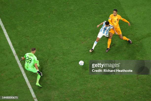 Nahuel Molina of Argentina scores the team's first goal past Andries Noppert of Netherlands during the FIFA World Cup Qatar 2022 quarter final match...