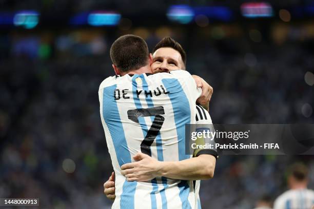 Rodrigo De Paul and Lionel Messi of Argentina celebrate their sides first goal during the FIFA World Cup Qatar 2022 quarter final match between...